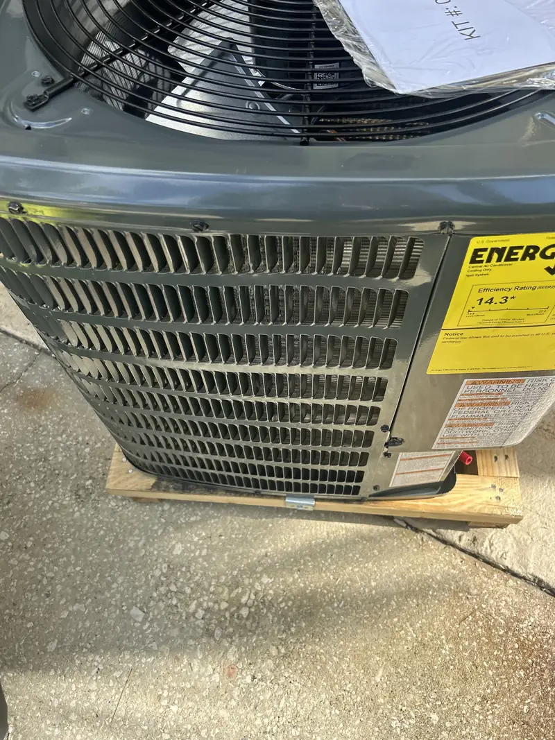 Close-up of a condenser fan and coil